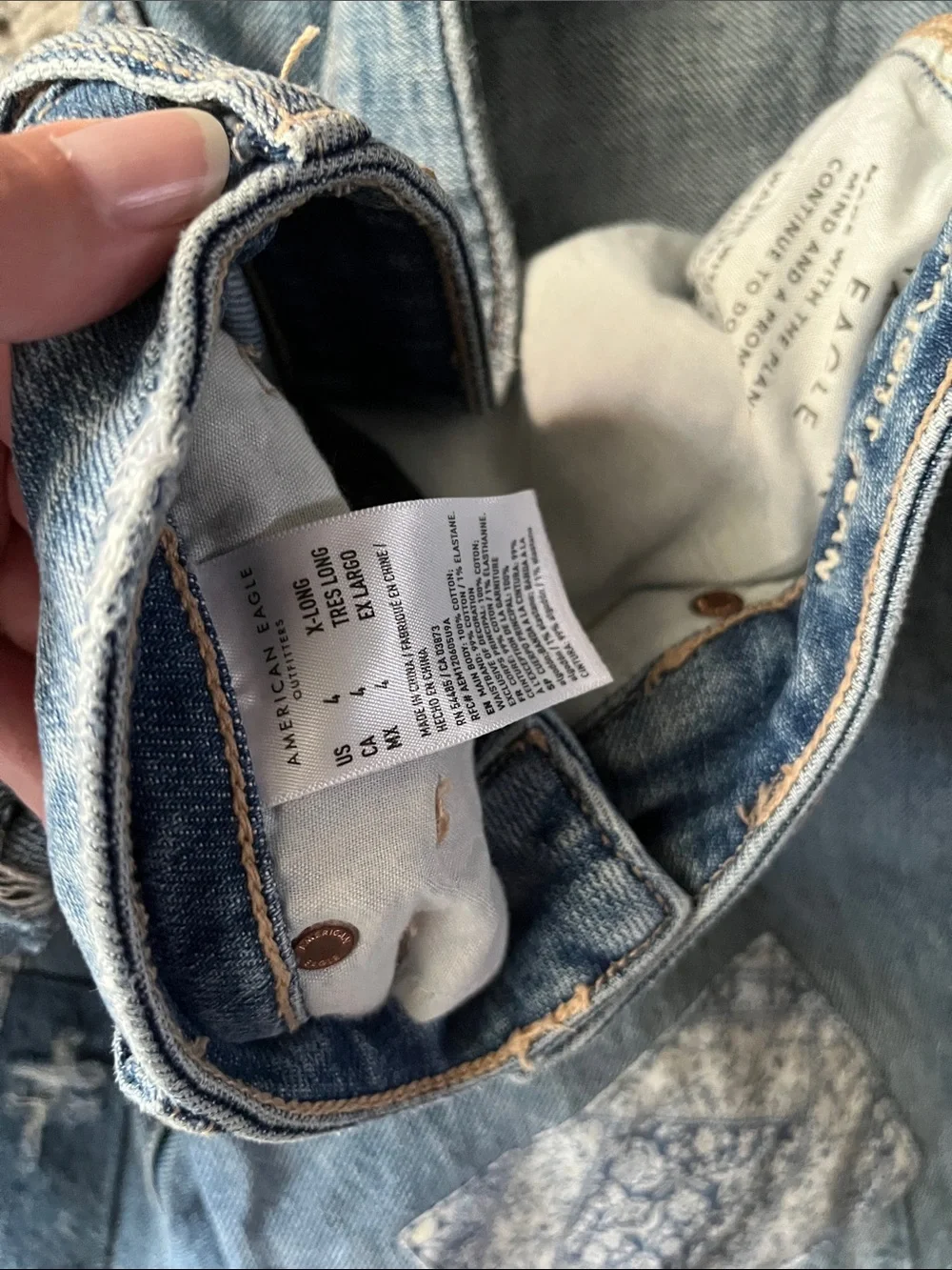 Patched straight leg jeans
